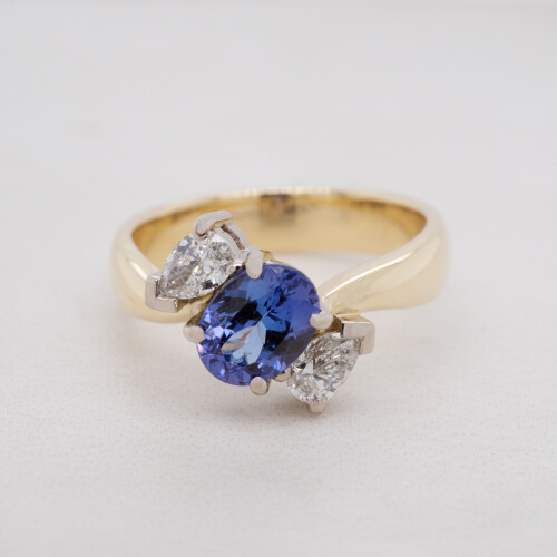 Sapphire and Diamond Three Stone Waved Ring