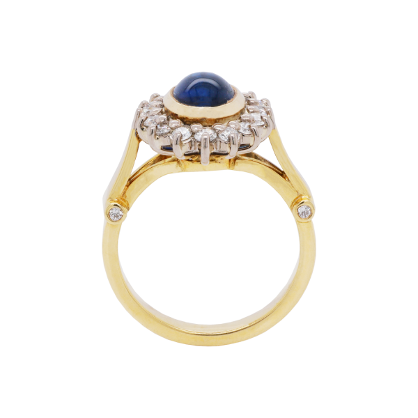 040250 Cabochon Sapphire Diamond Halo Ring Front 1080x1080