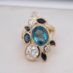 Blue Gemstone and Diamond Cluster Ring